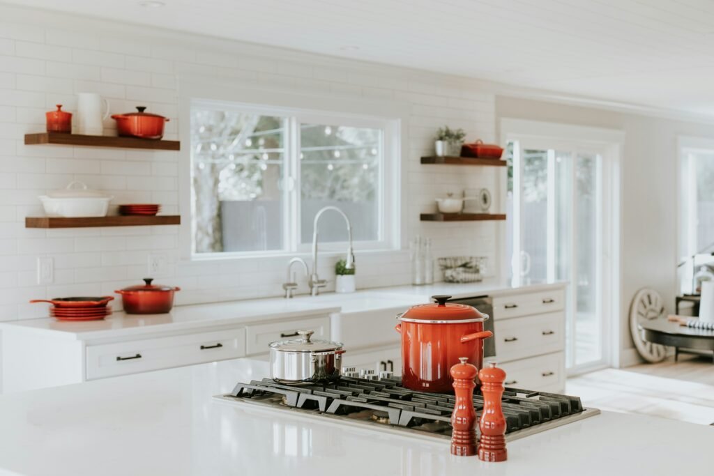 Modern kitchen with reusable cookware and sustainable zero-waste essentials on display.